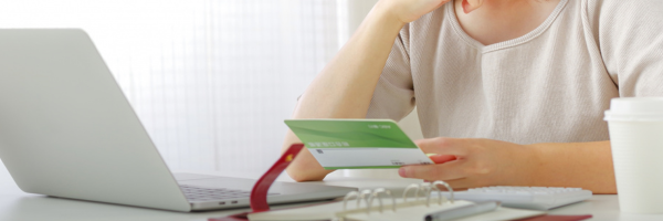 woman watching bank statement